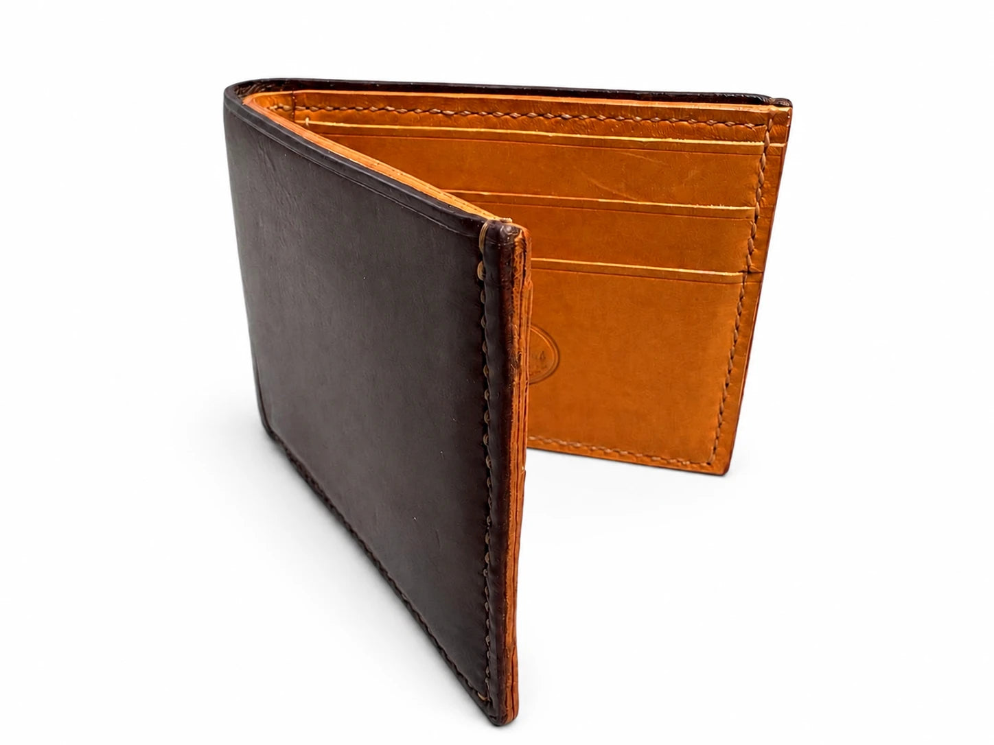 Leather Wallet — Dark leather. Warm interior.
